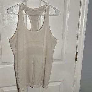 white swiftly tank top